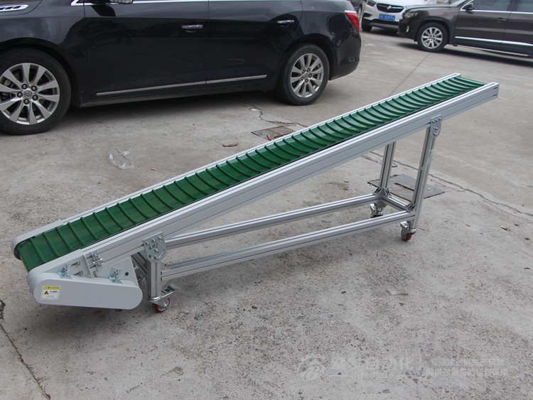 皮帶面加橫向?qū)l小型皮帶輸送機(jī) 皮帶面加橫向?qū)l小型皮帶輸送機(jī)