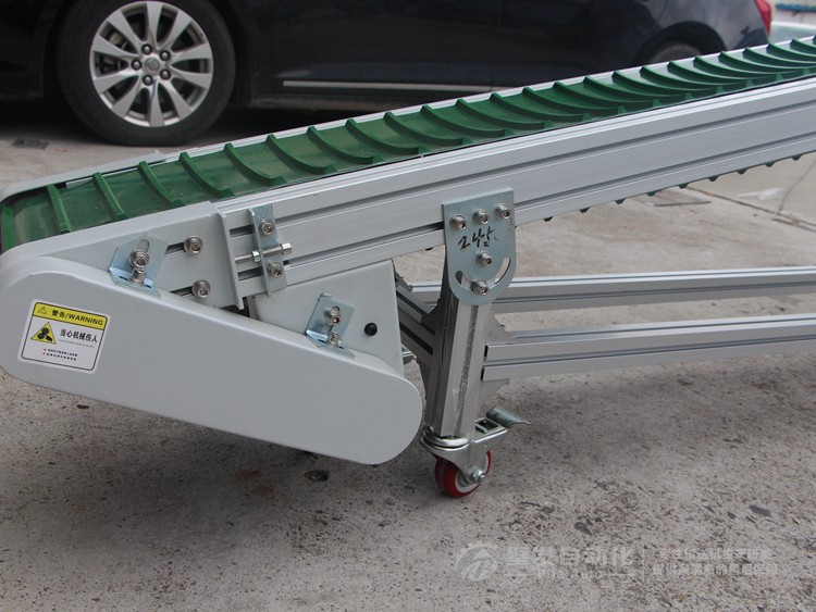 皮帶面加橫向?qū)l小型皮帶輸送機(jī) 皮帶面加橫向?qū)l小型皮帶輸送機(jī)