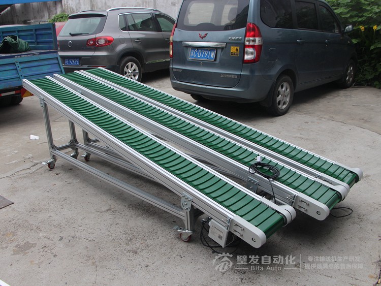 皮帶面加橫向?qū)l小型皮帶輸送機(jī) 皮帶面加橫向?qū)l小型皮帶輸送機(jī)